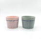 A Pair of Cups with Lids