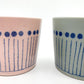 A Pair of Cups with Lids