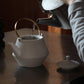Earthenware Teapot Frustum with Brass Handle